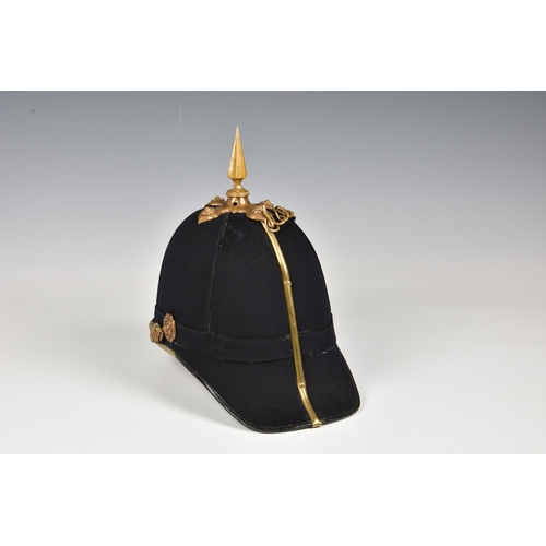 1834 - A 1st Royal Guernsey Militia Victorian Officer's black cloth Helmet, the black cloth covered skull w... 