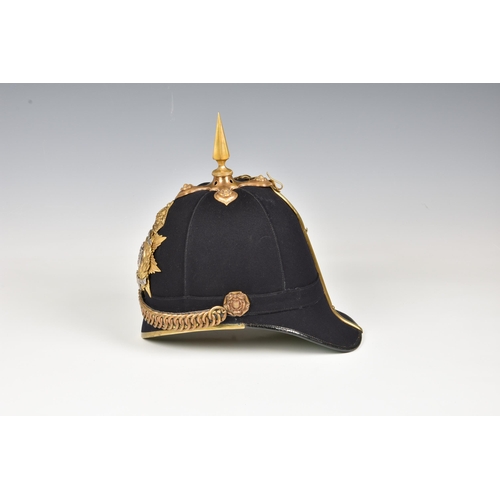 1834 - A 1st Royal Guernsey Militia Victorian Officer's black cloth Helmet, the black cloth covered skull w... 