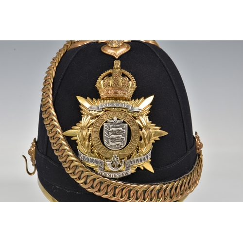 1834 - A 1st Royal Guernsey Militia Victorian Officer's black cloth Helmet, the black cloth covered skull w... 