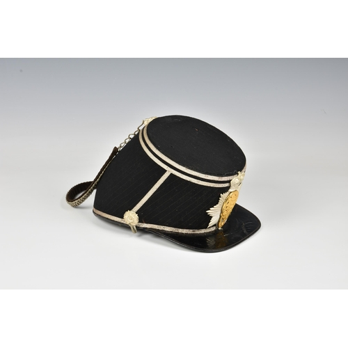 1836 - An extremely rare 2nd Royal Guernsey Militia shako, black cloth sides and top, having diagonal strip... 