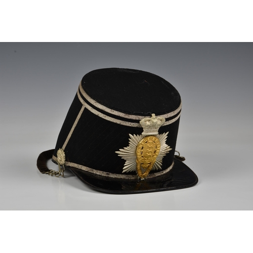 1836 - An extremely rare 2nd Royal Guernsey Militia shako, black cloth sides and top, having diagonal strip... 