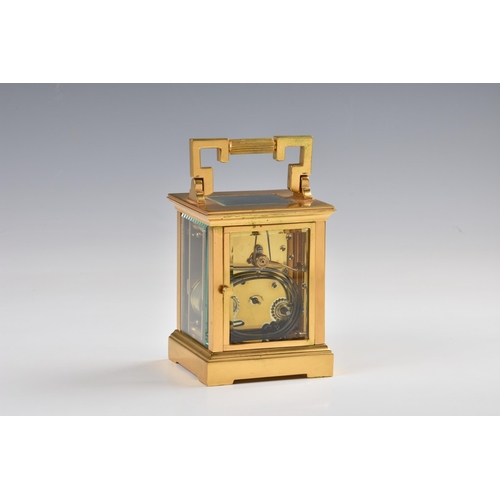 1943 - A French gilt brass carriage clock, c.1900, the white enamel Arabic dial signed 'Snow & Ashworth Har... 