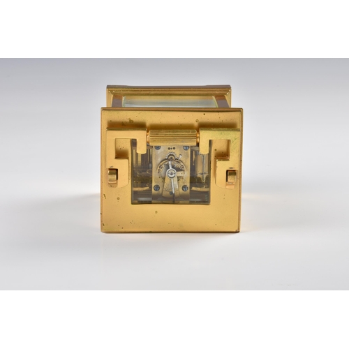 1943 - A French gilt brass carriage clock, c.1900, the white enamel Arabic dial signed 'Snow & Ashworth Har... 