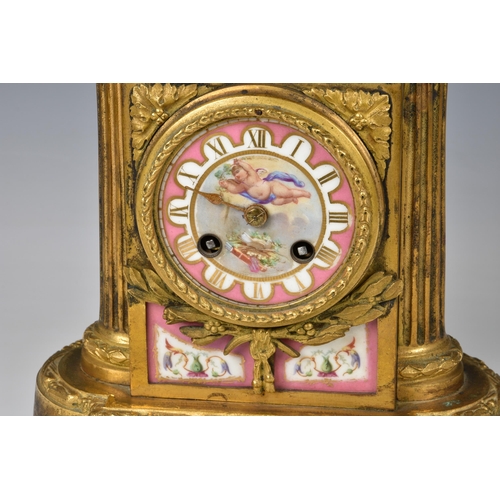 1945 - A 19th century French ormolu half hour striking mantel clock, the case with a urn finial with remova... 