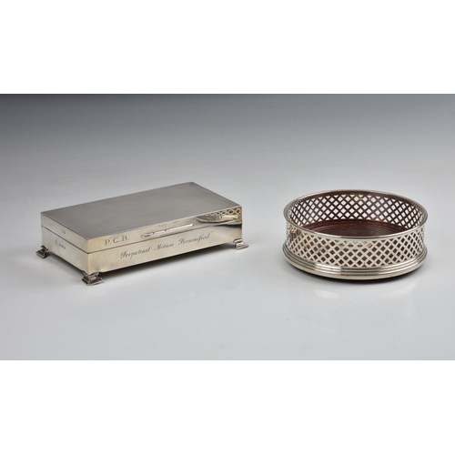 195 - A modern silver wine coaster, W I Broadway & Co., Birm. 1991, with pierced lattice sides and turned ... 