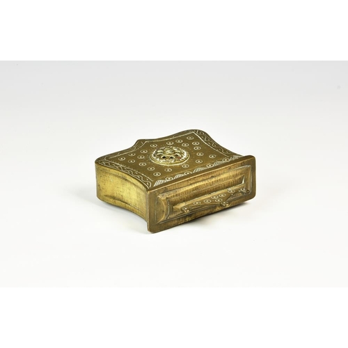 1960 - An Ottoman brass cartouche form palaska cartridge box / case, probably 19th century, with chased scr... 