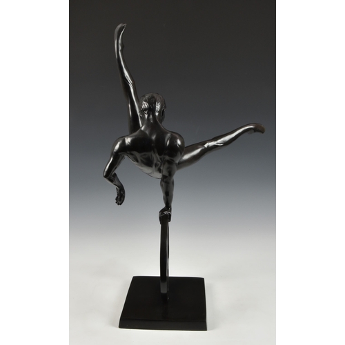 1971 - A large contemporary patinated bronze Male Gymnast sculpture, the gymnast performing flare on a ring... 