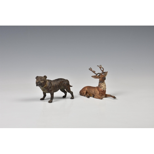 1980 - A German cold painted lead figure of a pug dog, early 20th century, 3in. (7.6cm.) high; together wit... 