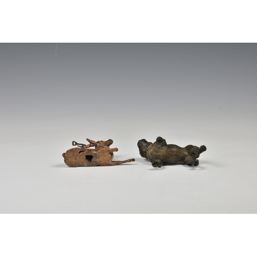 1980 - A German cold painted lead figure of a pug dog, early 20th century, 3in. (7.6cm.) high; together wit... 