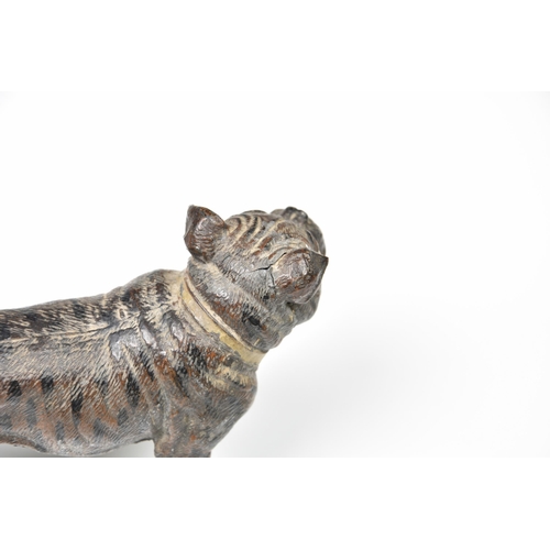 1980 - A German cold painted lead figure of a pug dog, early 20th century, 3in. (7.6cm.) high; together wit... 