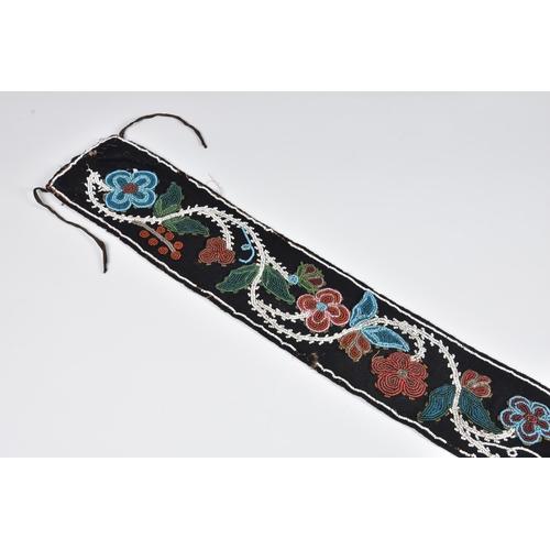 1994 - North American Indian interest - a 19th century Woodlands beaded sash, floral designs in red, white,... 