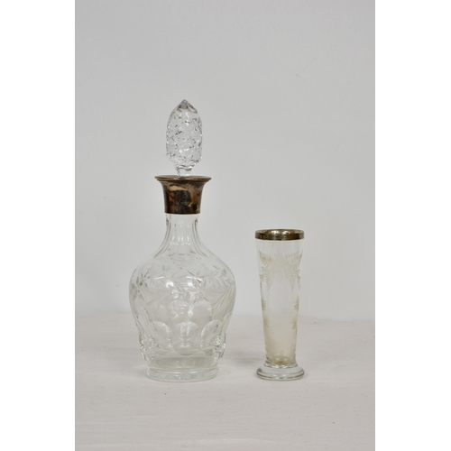 200 - A modern silver mounted cut glass decanter, J A Campbell, London 1985, having floral & foliate desig... 