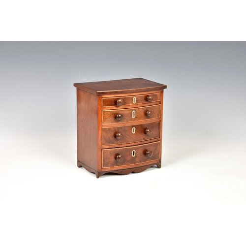 2019 - A mid-19th century apprentice piece miniature bowfront mahogany chest of drawers, made by the Master... 