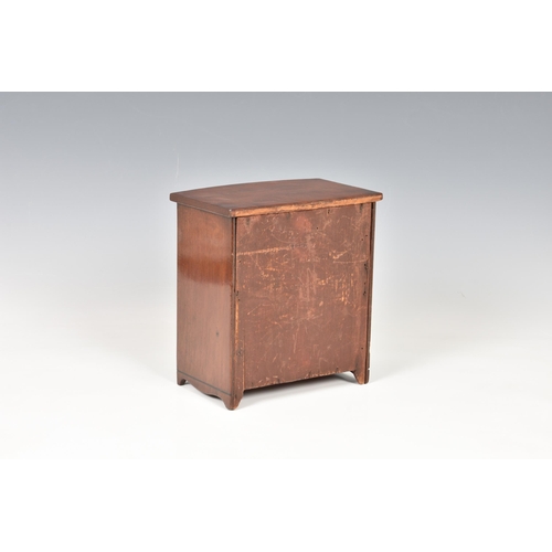 2019 - A mid-19th century apprentice piece miniature bowfront mahogany chest of drawers, made by the Master... 