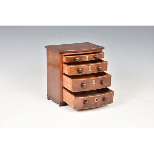 2019 - A mid-19th century apprentice piece miniature bowfront mahogany chest of drawers, made by the Master... 