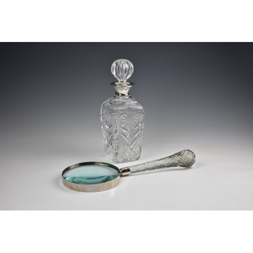 2072 - A large cut glass and chrome magnifying glass, late 20th century, 14½in. (36.8cm.) long; together wi... 