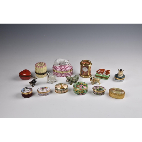 2075 - A group of enamel and porcelain trinket boxes, including Halcyon Days, Crummles and Limoges, includi... 