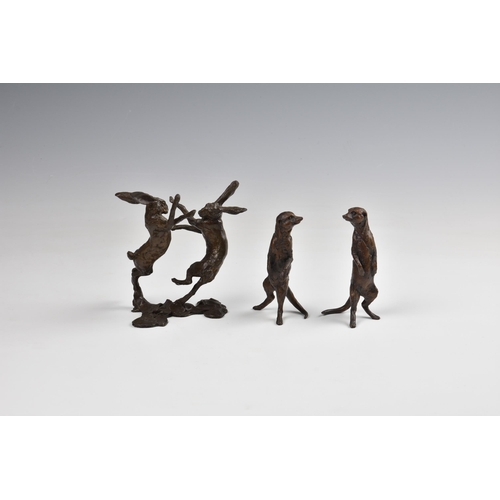 2079 - A miniature bronze of two boxing hares, in the manner of Paul Jenkins, stamped with foundry mark and... 