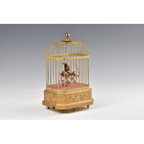 2081 - A German gilt metal singing bird automaton, early 20th century, marked 'K.G' for Karl Griesbaum, in ... 