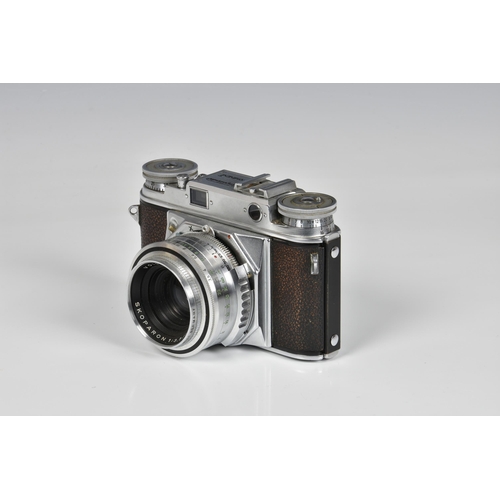 2105 - A Voigtlander Prominent Rangefinder Camera, serial No. B 42555, with Voigtlander Skoparon 1:3,5/35 L... 