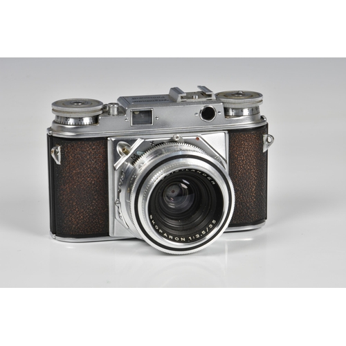 2105 - A Voigtlander Prominent Rangefinder Camera, serial No. B 42555, with Voigtlander Skoparon 1:3,5/35 L... 