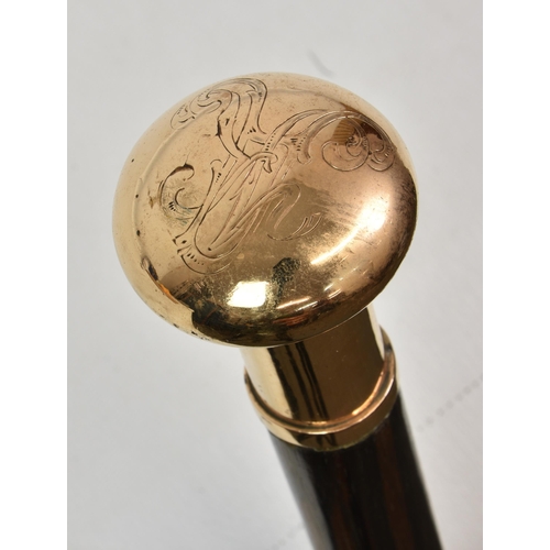 2136 - A Russian Gentleman's walking cane with gold mounted pommel, marked with indistinct Russian Hallmark... 