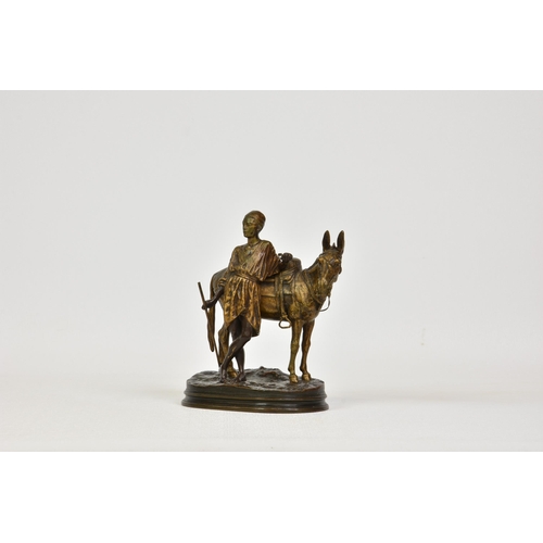 2145 - After Alfred Dubucand (French, 1828-1894), a French bronze figure group of 'L'ANIER DU CAIRE (A boy ... 