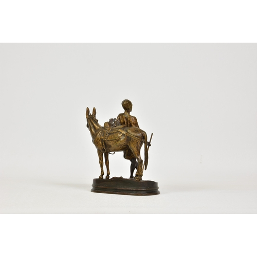 2145 - After Alfred Dubucand (French, 1828-1894), a French bronze figure group of 'L'ANIER DU CAIRE (A boy ... 