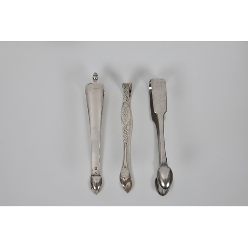 215 - Three pairs of silver sugar tongs, to include a pair of Georgian bright cut tongs, Peter & Ann Batem... 