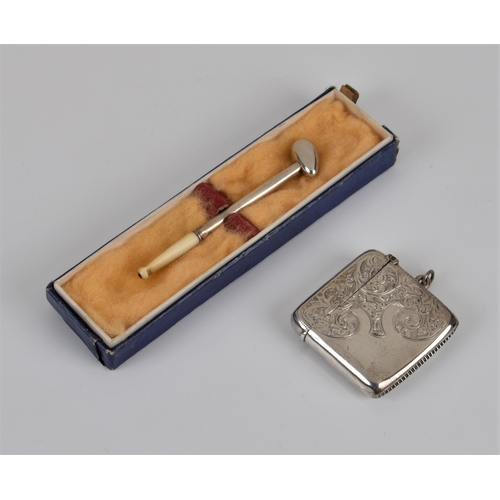 235 - An Edwardian silver vesta case and miniature pipe, the vesta case of square form, engraved with foli... 