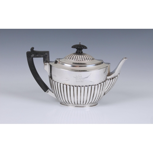 241 - A Victorian silver teapot, Walter & John Barnard, London 1886, of traditional half fluted design wit... 