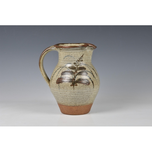 26 - David Leach OBE (1911-2005) - a stoneware jug, painted with foxgloves on a speckled grey-brown glaze... 