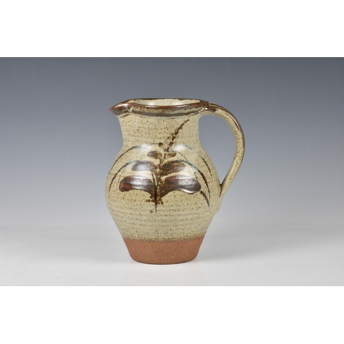 26 - David Leach OBE (1911-2005) - a stoneware jug, painted with foxgloves on a speckled grey-brown glaze... 