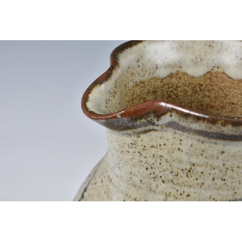 26 - David Leach OBE (1911-2005) - a stoneware jug, painted with foxgloves on a speckled grey-brown glaze... 