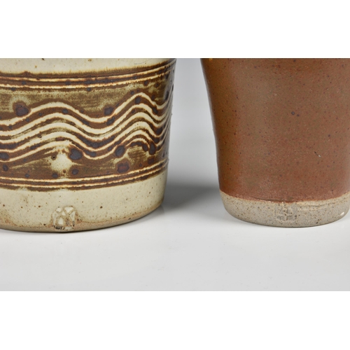 29 - Peter Arnold for Alderney Pottery - three stoneware studio pottery pieces, comprising an oil bottle,... 