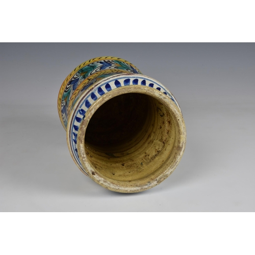 31 - An Italian maiolica polychrome albarello, 17th / 18th century, of slightly waisted form with flared ... 