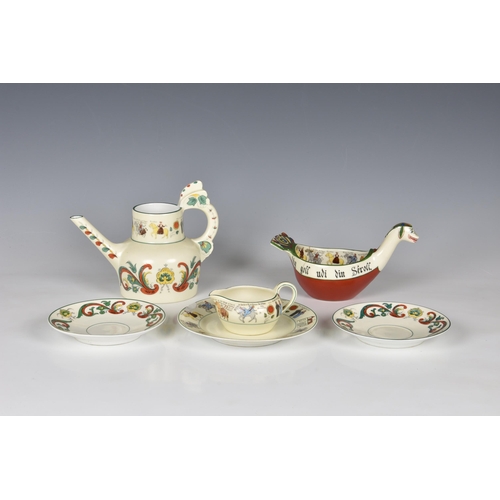 32 - A small group of porcelain by Porsgrund of Norway, comprising a coffee pot and two saucers, painted ... 