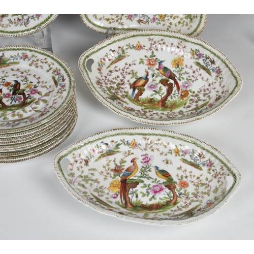 33 - A Chelsea style porcelain part dessert service, probably by Samson of Paris, with pseudo gold anchor... 