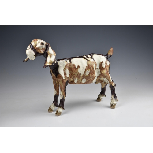 35 - Elaine Peto (British, b.1963), a studio pottery stoneware model of a goat, impressed potters seal ma... 