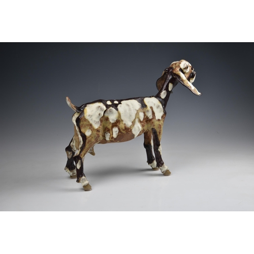 35 - Elaine Peto (British, b.1963), a studio pottery stoneware model of a goat, impressed potters seal ma... 