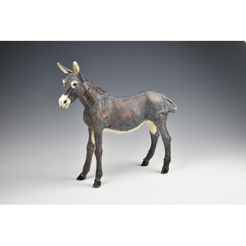 36 - Elaine Peto (British, b.1963), a studio pottery stoneware model of a donkey, impressed potters seal ... 