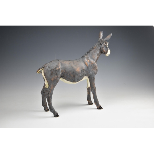 36 - Elaine Peto (British, b.1963), a studio pottery stoneware model of a donkey, impressed potters seal ... 