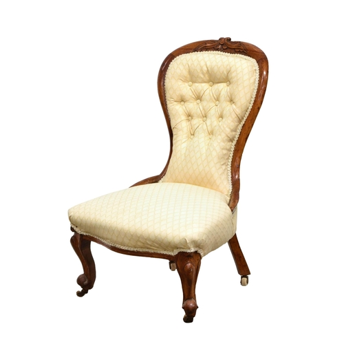 697 - A Victorian walnut nursing chair,