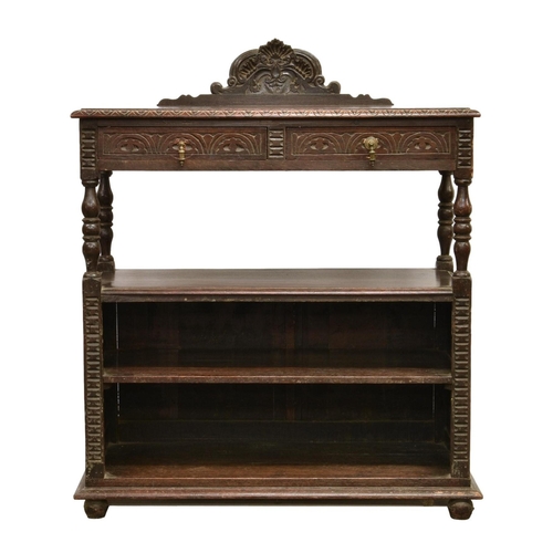 700 - A Victorian carved oak three tier buffet, with two frieze drawers, 43½ x 18¼in. (110 x 46cm.), 43¼in... 