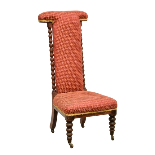 702 - A Victorian mahogany prie-dieu chair,