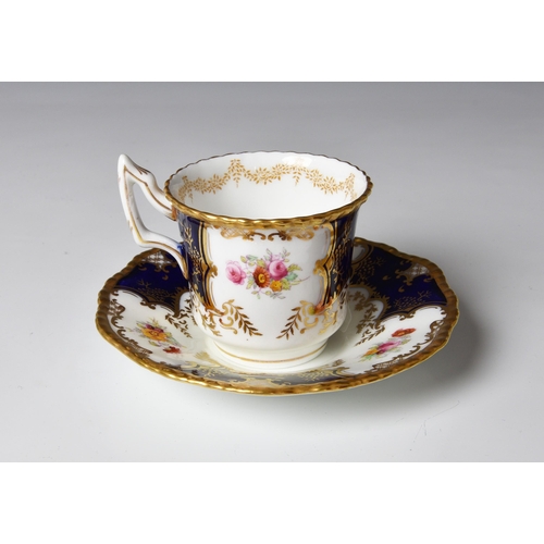 71 - A Coalport bone china part coffee service, c.1910, in the blue 'Batwing' pattern, no. 2665, made for... 