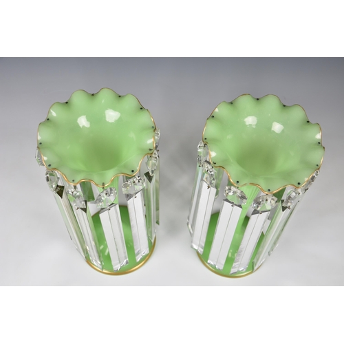 72 - A pair of Victorian green glass table lustres, the opaque, pale green glass vases with gilt, scallop... 