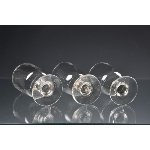 76 - *** WITHDRAWN *** A good matched set of sixteen Victorian glass rummers, with plain bucket bowls on ... 