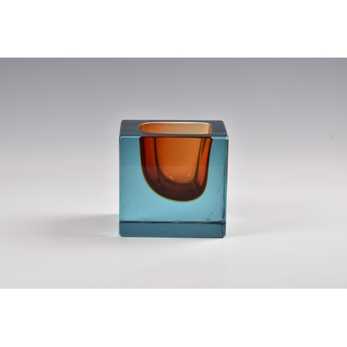 83 - A 1960s square art glass paperweight style vase, in blue and orange, 3¾in. (9.5cm.) high.. * Scratch... 