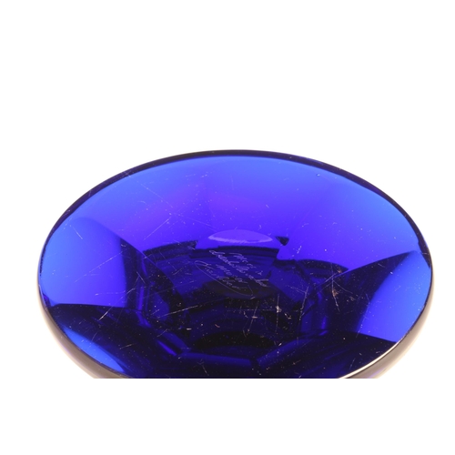 91 - A Moser cobalt blue glass urn with flared rim, acid cut neo classical gilt freeze encircling the bas... 